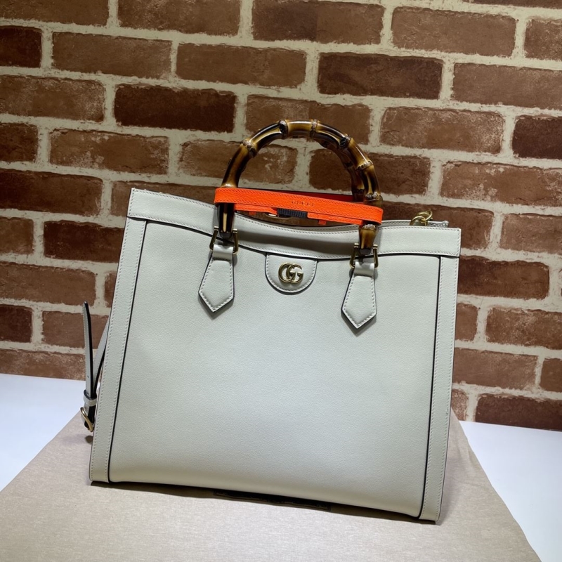 G*u*i top handle bags